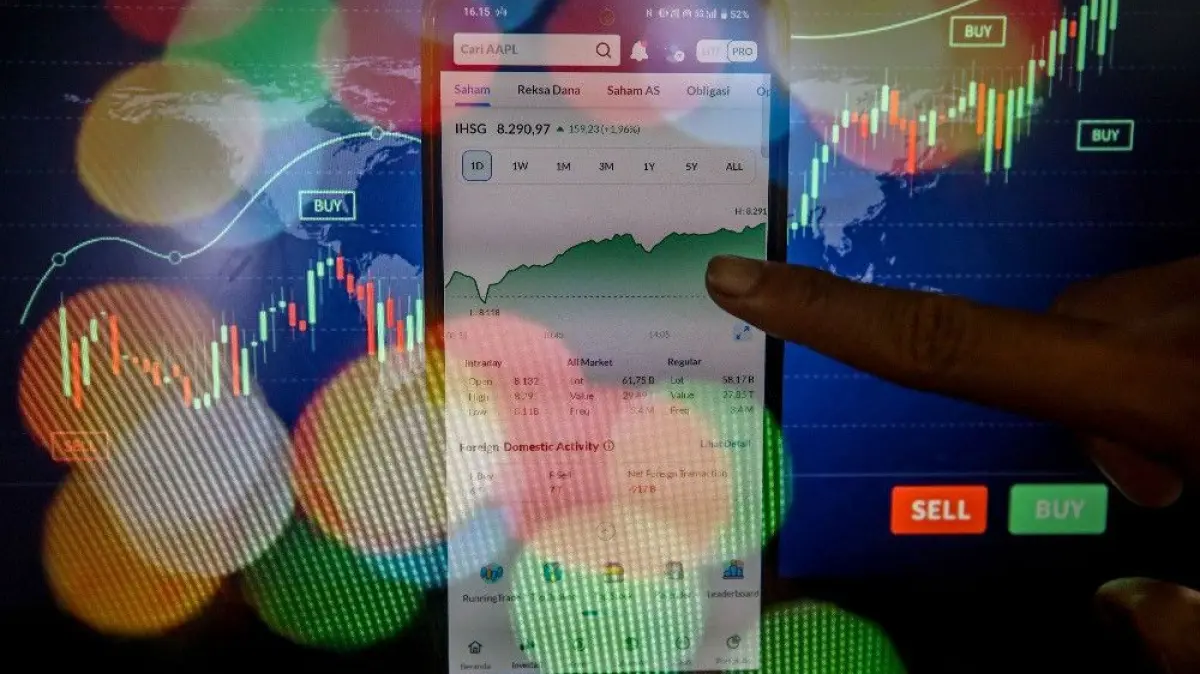 Investor mengamati pergerakan Indeks Harga Saham Gabungan (IHSG) di Jakarta, Rabu(11/2/2026)./JIBI/Bisnis/Eusebio Chrysnamurti