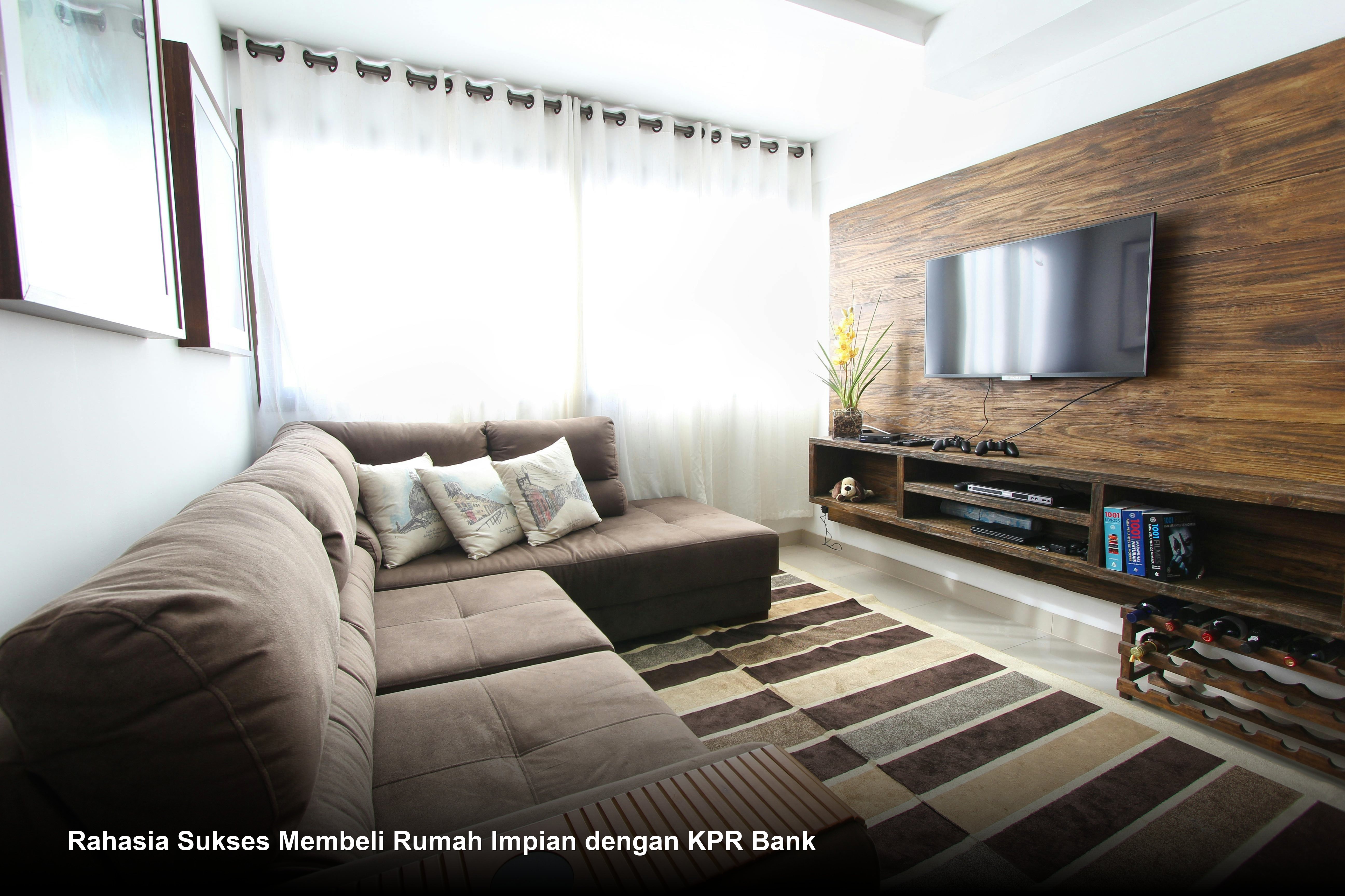 Rumah minimalis modern yang asri dengan taman yang indah dan suasana yang tenang, cocok untuk dijadikan rumah impian.